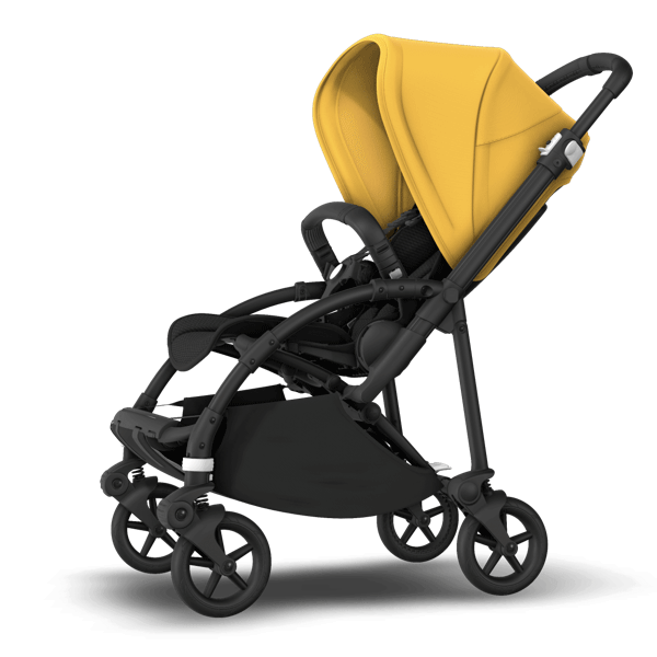 Bugaboo Bee 6 stroller with seat and yellow sun canopy.